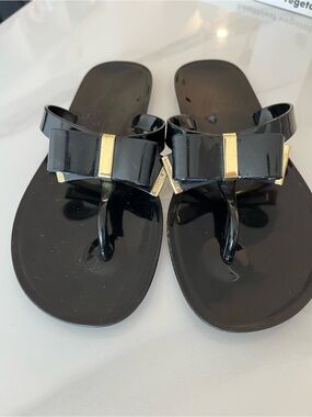 Michael Kors Black Bow Thong Sandals with Gold Accent